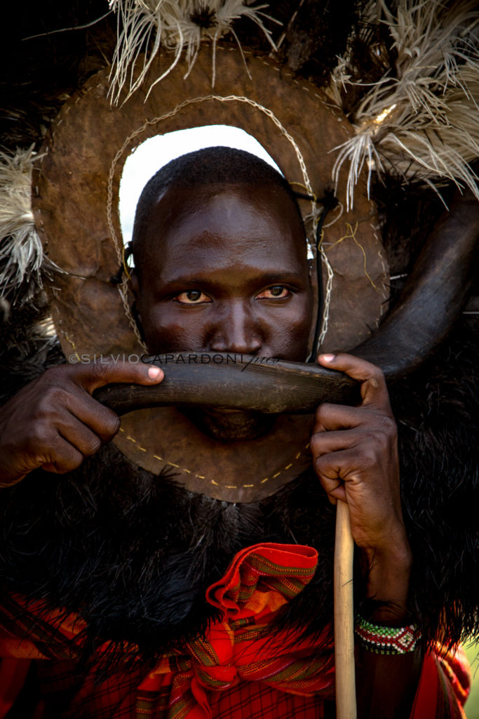 Maasai rituals with kudu antelope horn and ostrich feather hairstyle, Narok, Kenya